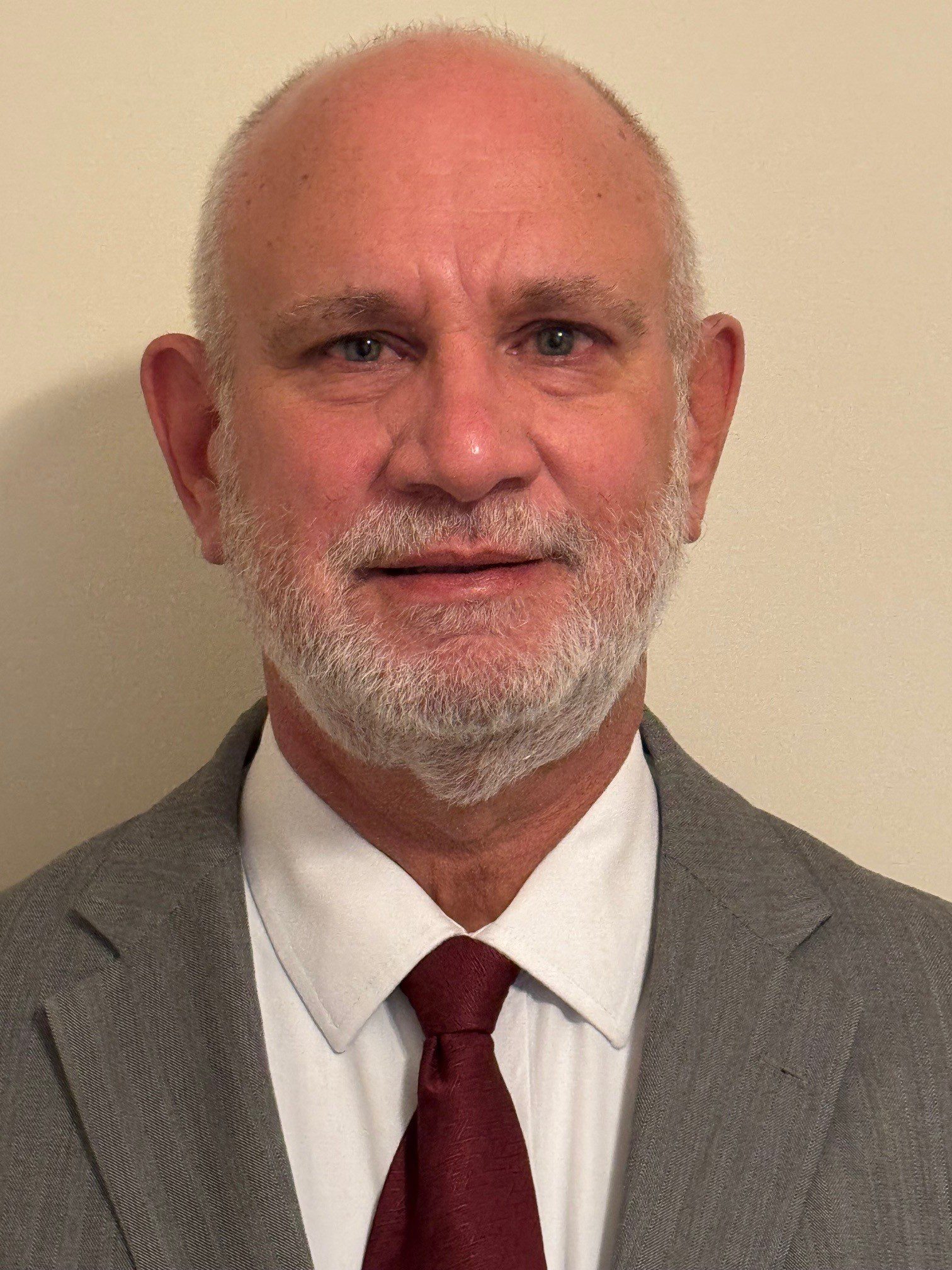 68a5eda5c8805_HeadshotFront